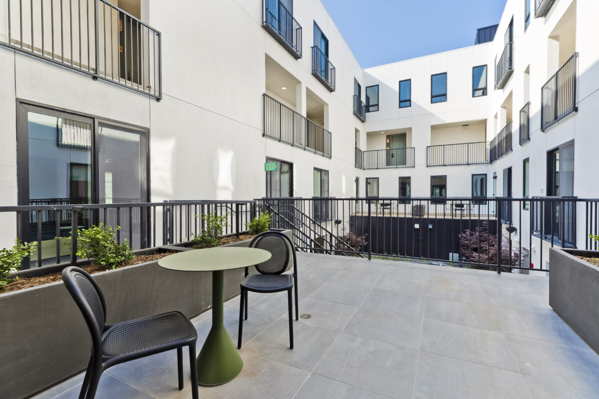 outdoor area with a two coffee table