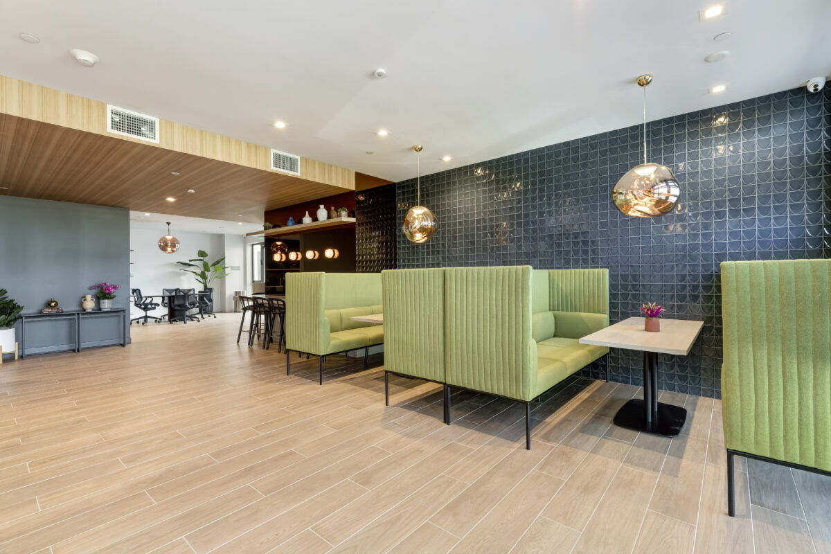 extended view of co-working area with private pods