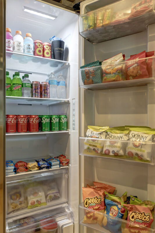 Fridge full of drinks and snacks