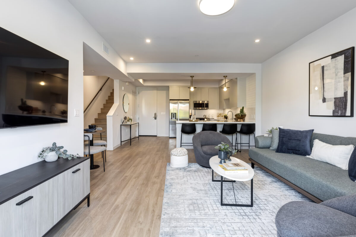 living room with relaxation and view of kitchen