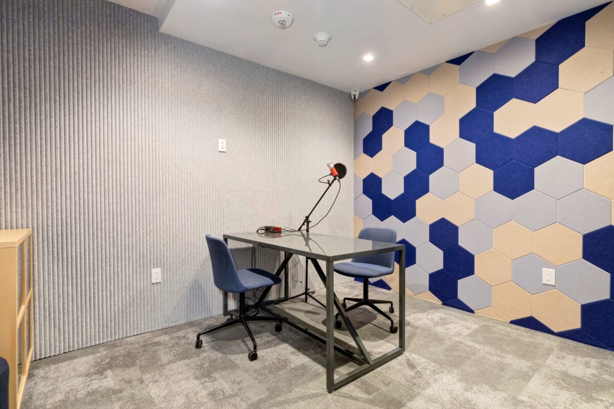 Podcast room with desk and microphones