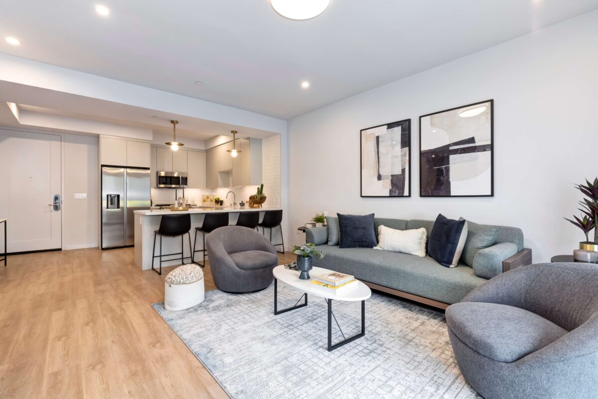 Open concept living room with view into kitchen